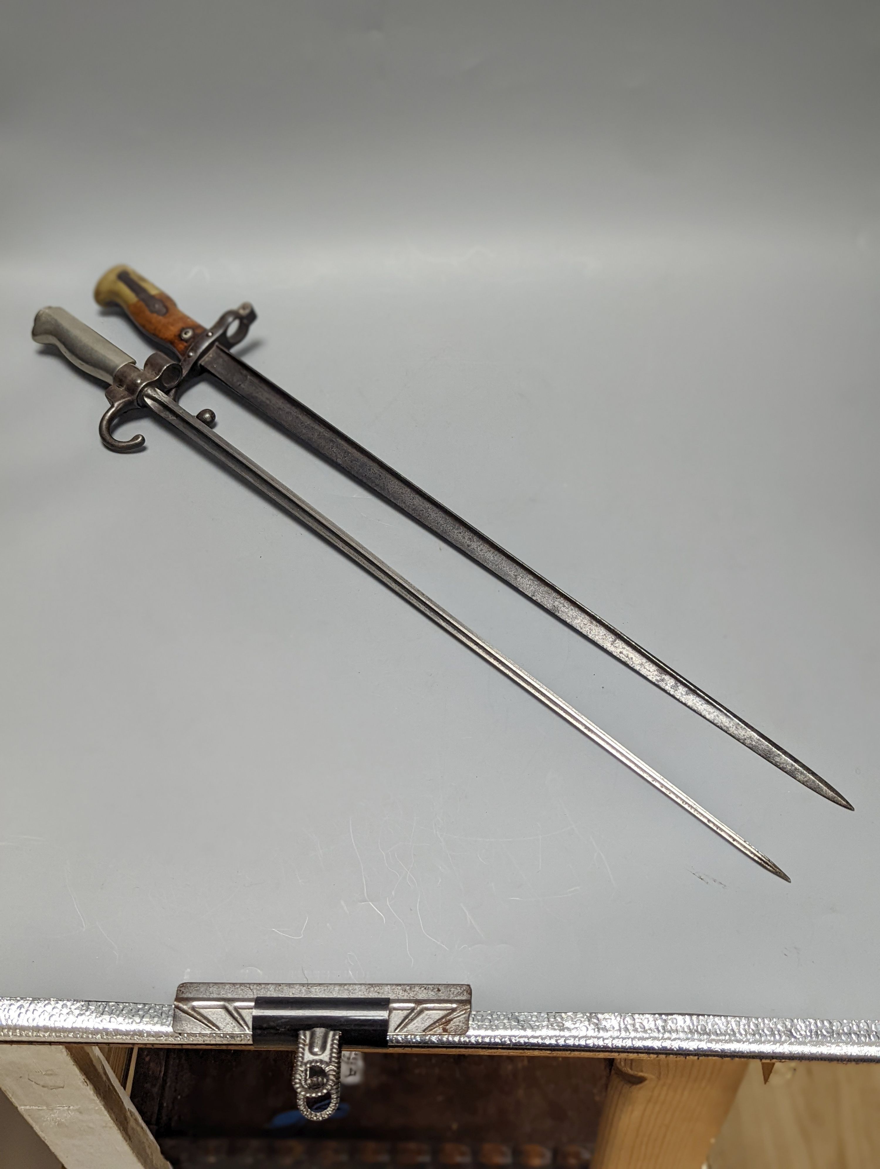 Two French bayonets, 19th century and early 20th century